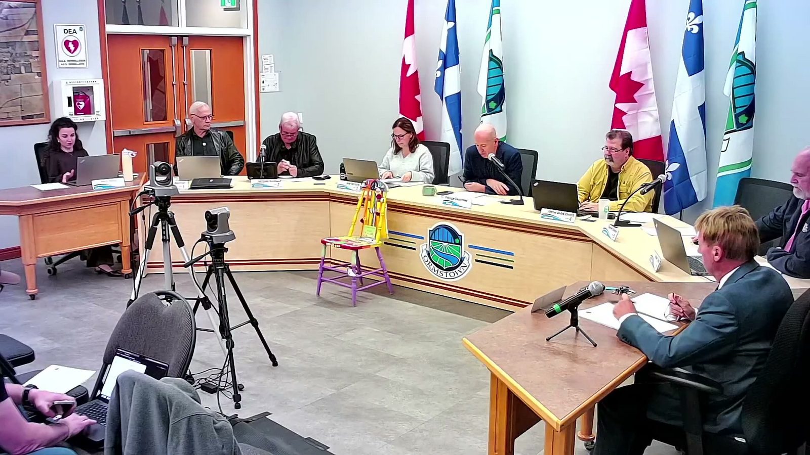 The Ormstown council table during the regular sitting of October 6, 2026, seen from the back of the council chamber.